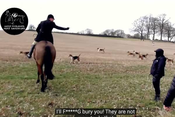 A huntsman remonstrates with a saboteur over attempts to divert hounds from a scent