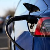 Undated file photo of an electric car being charged, as the UK Government appears less likely to meet its net zero targets since it became more transparent on its plans, its climate advisers have said.