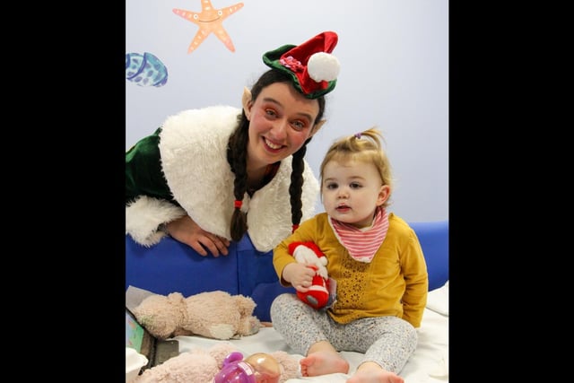 Warwick Castle staff and Elves surprised children on Warwick Hospital children's ward with board games and toys. Photo by Warwick Castle