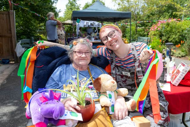 Resident Carole and team member Emily enjoy summer festival at Priors House. Picture by Shaun Fellows / Shine Pix Ltd