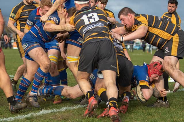 Nathan Batchelor (Red cap) scores for Leamington. Pic by Ken Pinfold.