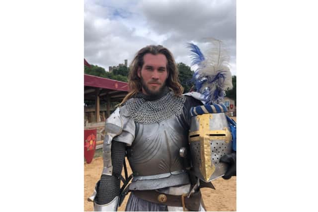 Will Arnold as a Yorkist Knight in Wars of the Roses Live! at Warwick Castle. Photo by Warwick Castle