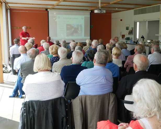 Volunteers from the Warwickshire Lowland Search & Rescue speaking to members of the Warwick Probus Club No.1 at a packed-out meeting.