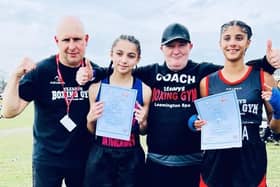Jaya Kalsi and Serena Mali celebrate with their coaches.