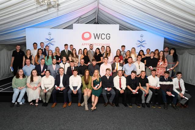 Apprentices celebrating at graduation event. Photo supplied