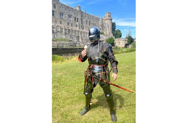 Clad in plate and chainmail armour and complete with helmet and visor, the brave knights at Warwick Castle show their mettle when temperatures rise. Photo supplied by Warwick Castle