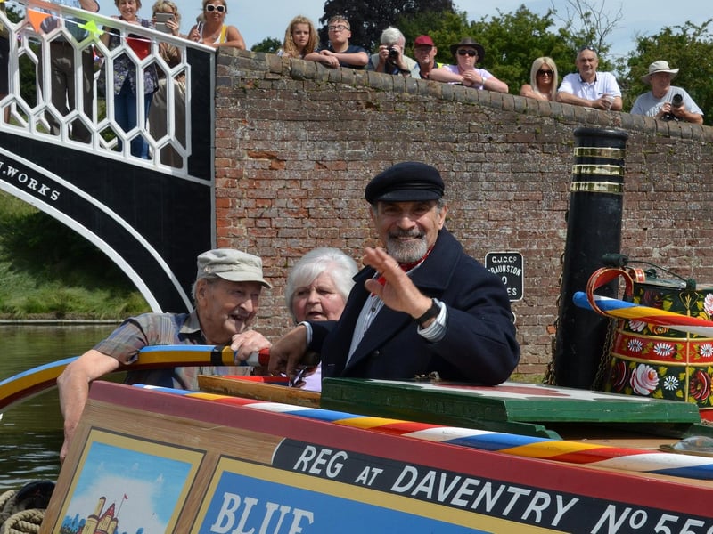 David Suchet pictured opening the 2018 Braunston Historic Narrowboat Rally on the 1958 Braunston-built Raymond narrowboat, together with Aubrey Berriman, who built the boat, and former working boat woman Alice Lapworth.