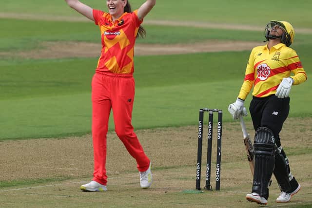 Emily Arlott celebrates a wicket whilst with Birmingham Phoenix.