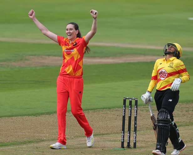 Emily Arlott celebrates a wicket whilst with Birmingham Phoenix.