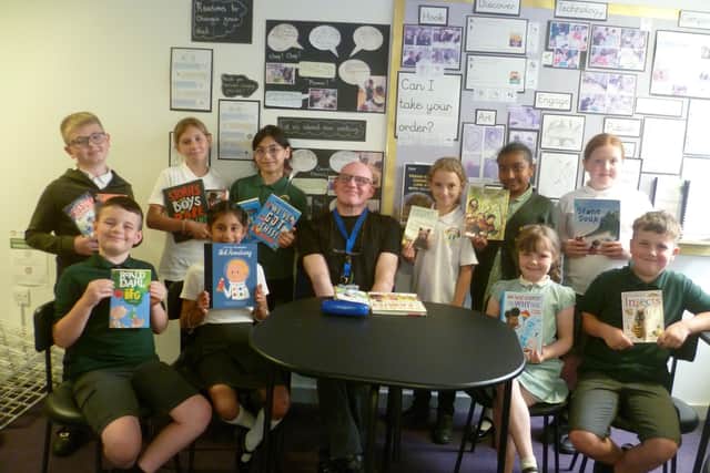 The children love to read with Tony.