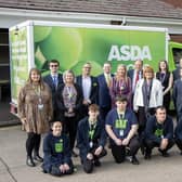 (Back row second left) Andrew Holston, (middle row centre left) Sue Tunmoore and Carmel McKeough, (back row far right) Simon Lomax. (Front row left), Leo.jpeg