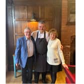Kenilworth couple Peter and Pat Murchison with Adam Bennett, executive chef at The Cross. Photo supplied