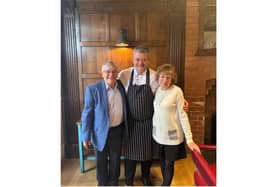 Kenilworth couple Peter and Pat Murchison with Adam Bennett, executive chef at The Cross. Photo supplied