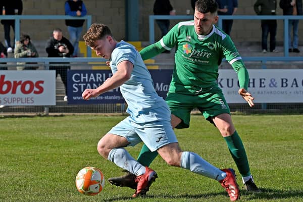 Tom Fielding in action for Rugby Town during their 1-0 defeat to Newport Pagnell Town. Picture by Martin Pulley