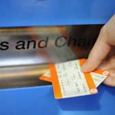 Undated file photo of a person buying a train ticket. English rail fares will rise by up to 8% in 2024 if the Government uses the same formula as this year, new figures show. The Department for Transport (DfT) aligned this year's cap on train fare increases with Britain's average earnings growth for July 2022, which was 5.9%. Figures published by the Office for National Statistics on Tuesday show the same measure for July 2023 was 8%. Issue date: Tuesday September 12, 2023.