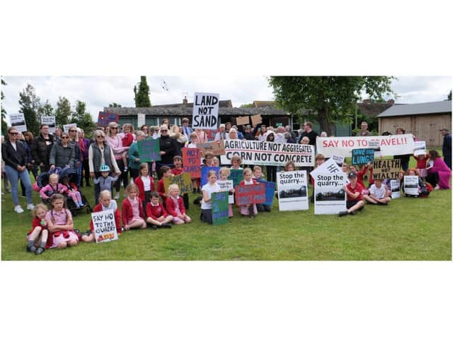 Residents from in and around Barford gathered outside the community centre in the village in protest against the plans for a sand and gravel quarry outside Barford. At the time Smith's Concrete was holding a public exhibition about its plans for the site. Photo supplied