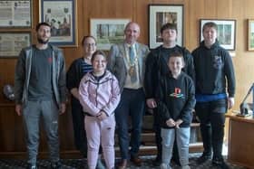 Rugby Mayor Simon Ward with Joel and his family.
