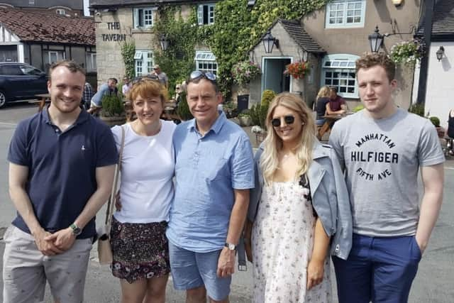 Anthony Lane, pictured right, with Paul and Penny Lane and brother Richard and sister Kat.