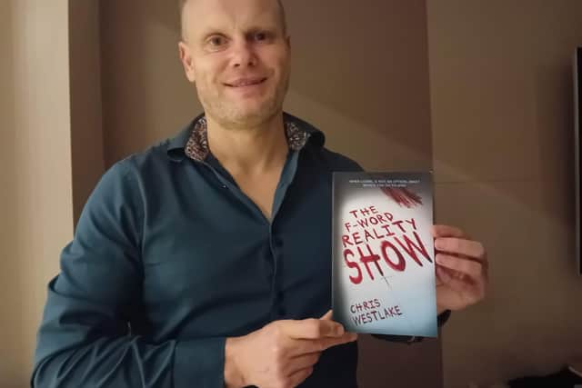Chris Westlake with his new book The F-Word Reality Show.