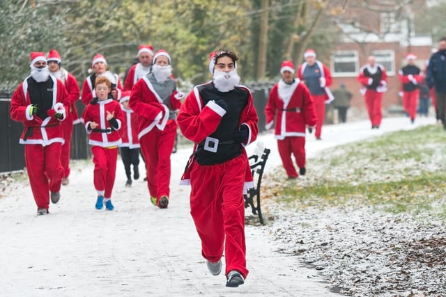 This year's Santa Dash took place with some snow. Photo by David Hastings/dh Photo