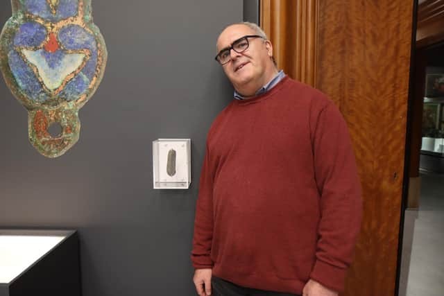 Graham Senior, finder of the stone, with Ali Wells, exhibition curator at the Herbert Art Gallery and Museum in Coventry. Photo by The Herbert Art Gallery and Museum.