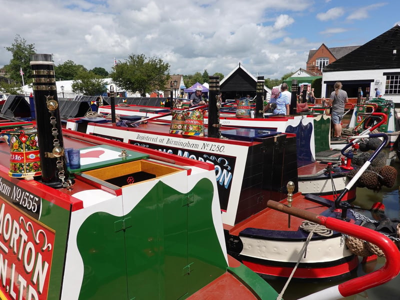 Historic narrowboats pictured in the Old Oxford Canal Arm at Braunston Marina.