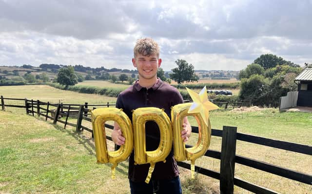 Rugby College student Samuel Canham celebrates his grades.