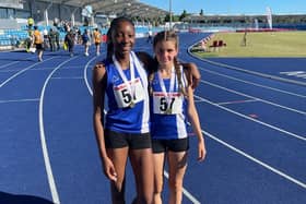 Savannah Morgan and Ella Darby show off their gold medals after helping Northamptonshire to victory in the Junior Girls 4x100m relay at the English Schools Championship