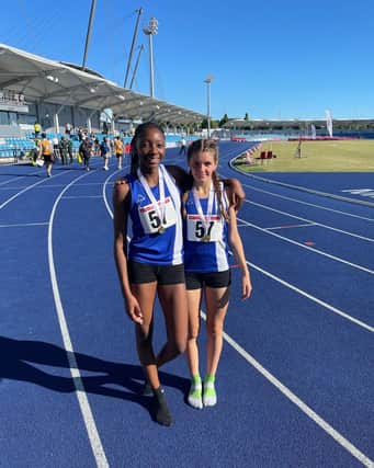 Savannah Morgan and Ella Darby show off their gold medals after helping Northamptonshire to victory in the Junior Girls 4x100m relay at the English Schools Championship