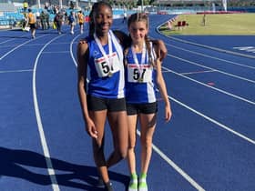 Savannah Morgan and Ella Darby show off their gold medals after helping Northamptonshire to victory in the Junior Girls 4x100m relay at the English Schools Championship