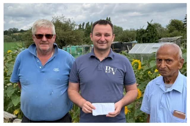 Dave Dawkins who is helping Ram with work on Allotment, Dawid Kozlowski and Ram Prinjha. Picture supplied.