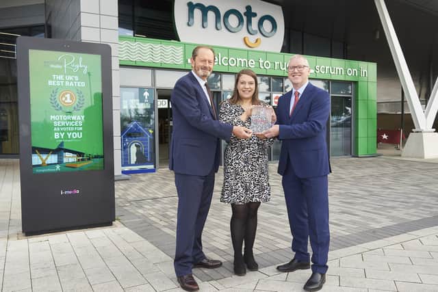 Rugby services exterior - award being presented (left to right) by Transport Focus chief executive Anthony Smith, Moto Rugby site operations manager Alex Purcarea and Moto chief executive Ken McMeikan. Photo supplied