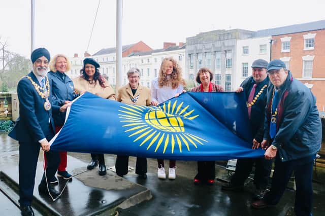 Pictured raising the Commonwealth Flag from left to right: Councillor Parminder Singh Birdi, Mayor of Warwick; Christina Boxer, WDC Commonwealth Games Programme Manager; Councillor Mini Kaur Mangat, Chair of Warwick District Council; Mrs Pat Edgington, Royal British Legion Chairman; Lauren Cox, Commonwealth Games Swimming Relay Bronze Medallist; Councillor Sidney Syson, Vice-Chairman of Warwick District Council; Councillor Nick Wilkins, Mayor of Royal Leamington Spa; Councillor Barry Franklin, Mayor of Whitnash.