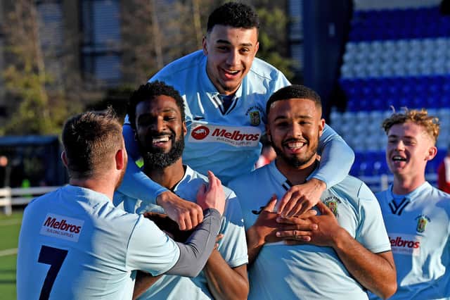 Rugby Town celebrate one of their goals in last weekend's 5-3 victory at Coventry United. Pictures by Martin Pulley