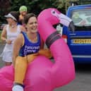 Sophie Knee-Higgins and her team of runners ran through Kineton dressed as an inflatable flamingo, Forest Gump, Princess Jasmine and Mr Motivator.