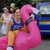 Sophie Knee-Higgins and her team of runners ran through Kineton dressed as an inflatable flamingo, Forest Gump, Princess Jasmine and Mr Motivator.