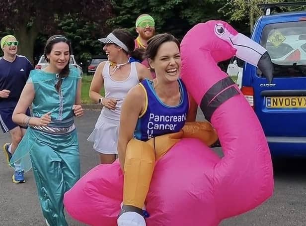 Sophie Knee-Higgins and her team of runners ran through Kineton dressed as an inflatable flamingo, Forest Gump, Princess Jasmine and Mr Motivator.