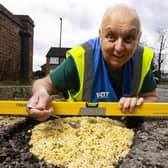 Mark Morrell, aka Mr Pothole, fixes a pothole with Pot Noodle as the first step in his new potty campaign