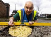 Mark Morrell, aka Mr Pothole, fixes a pothole with Pot Noodle as the first step in his new potty campaign