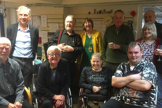 Robin Brooks, second on the left on the top row, with Ian Wenman from Wenmans Mobility on his left and Cllr Sidney Syson, chair of Warwick District Council, on his right. Picture supplied.