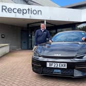 Richard Roberts (left), dealership principal at Startin Kia – Warwick, and Barry Andrews, chairman of Leamington Rotary Club’s fundraising committee, with a Kia EV electric car.