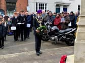 Warwick Mayor, Cllr Parminder Singh Birdi laying a wreath at the war memorial. Photo by Rick Thompson