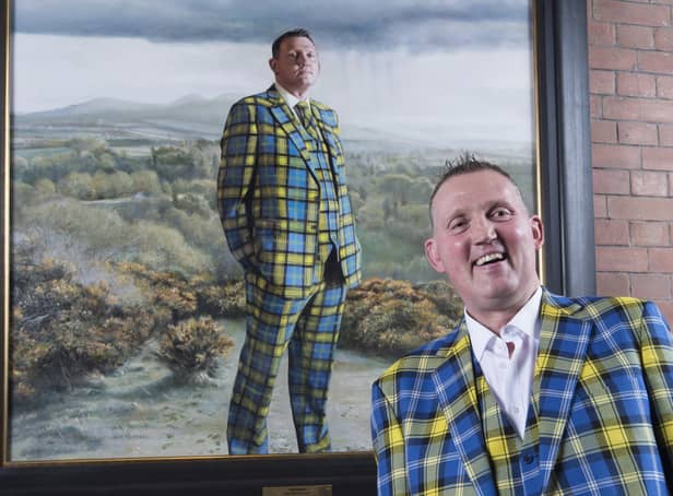 <p>Doddie Weir with his painting in the Scottish National Portrait Gallery (SNPG)</p>