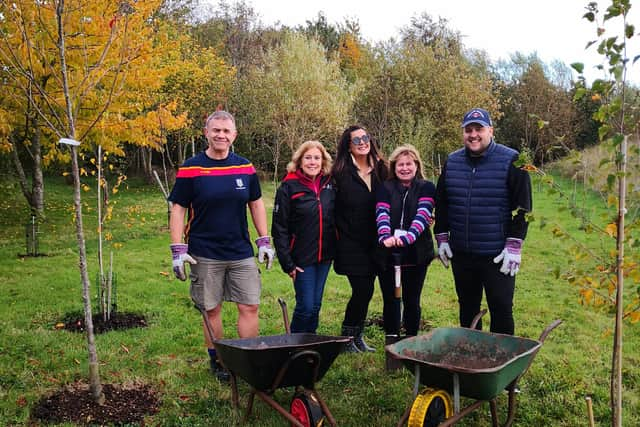 Bridgestone volunteers working on Paintings Plantation at Campion School. Picture supplied.