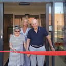 New residents Alison Partridge and John Ackerman, cutting the ribbon to open the new care home. Stood behind them is Phillippa Cook, general manager of the home. Photo supplied