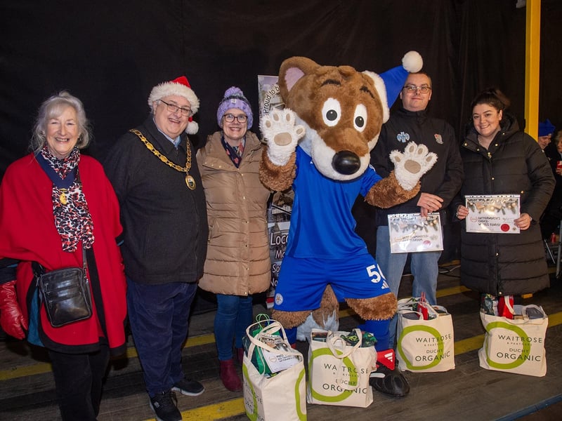 Best window display winners with from left, Consort Valerie Ridley, Lutterworth Mayor Rob Coleman and Filbert Fox.