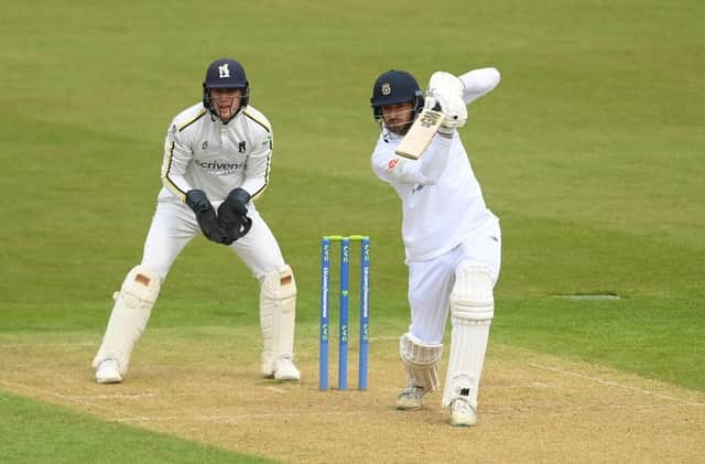 Michael Burgess has agreed a one-year extension to keep him at Edgbaston until at least the end of 2025.