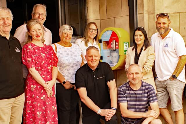 Launching the 52nd defibrillator with Jamie's family, theatre representatives and the companies who have helped make it possible. Picture: Patrick Joyce.