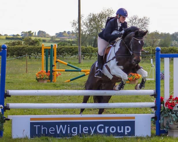 A rider competes at the National Schools and Riding Clubs Two-Day Event, sponsored by The Wigley Group