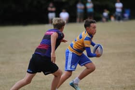 Players taking place in The National Junior Touch Cup at Old Leamingtonians RFC.